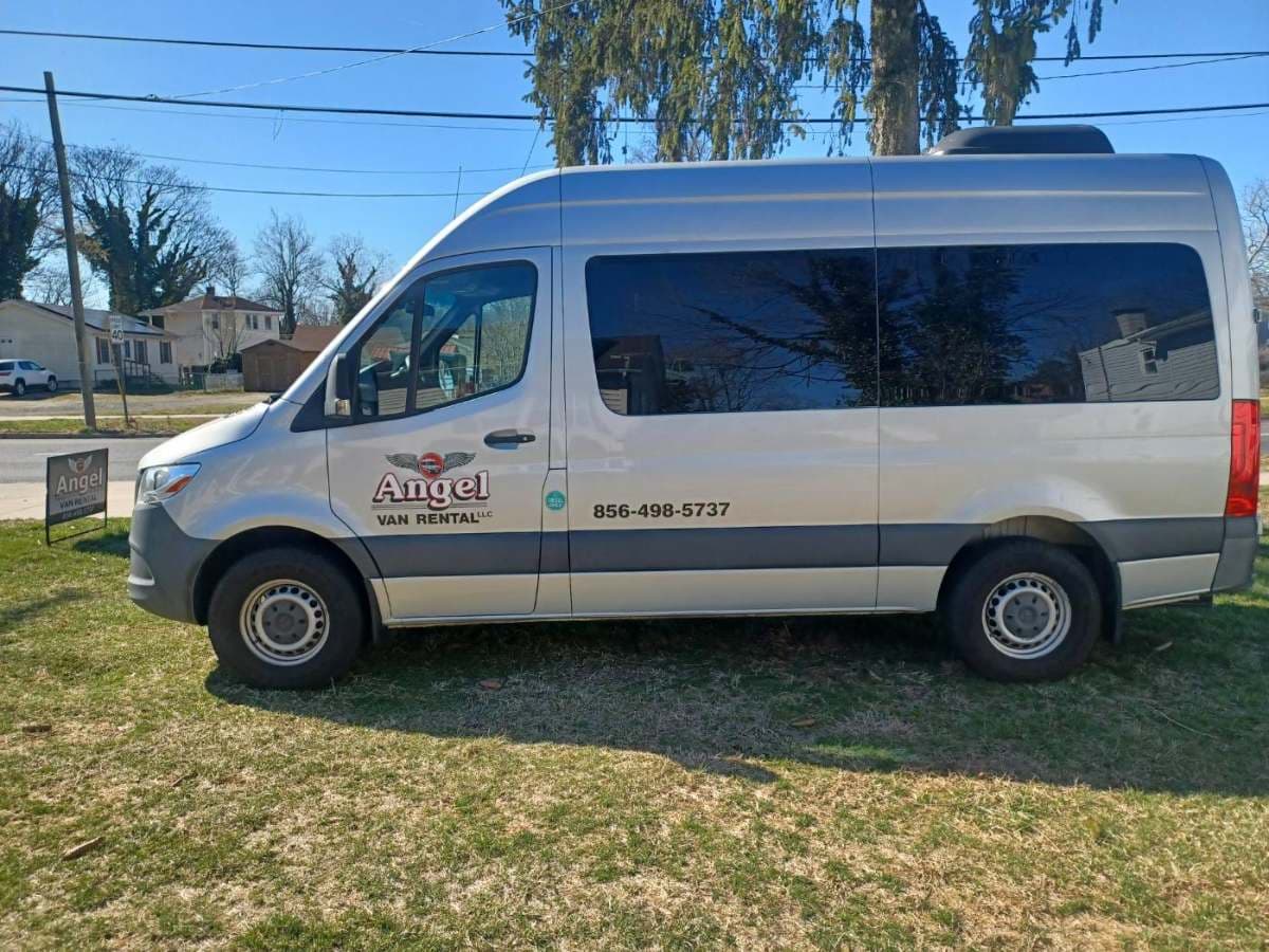 Gray Mercedes Sprinter parked and ready for an early airport run